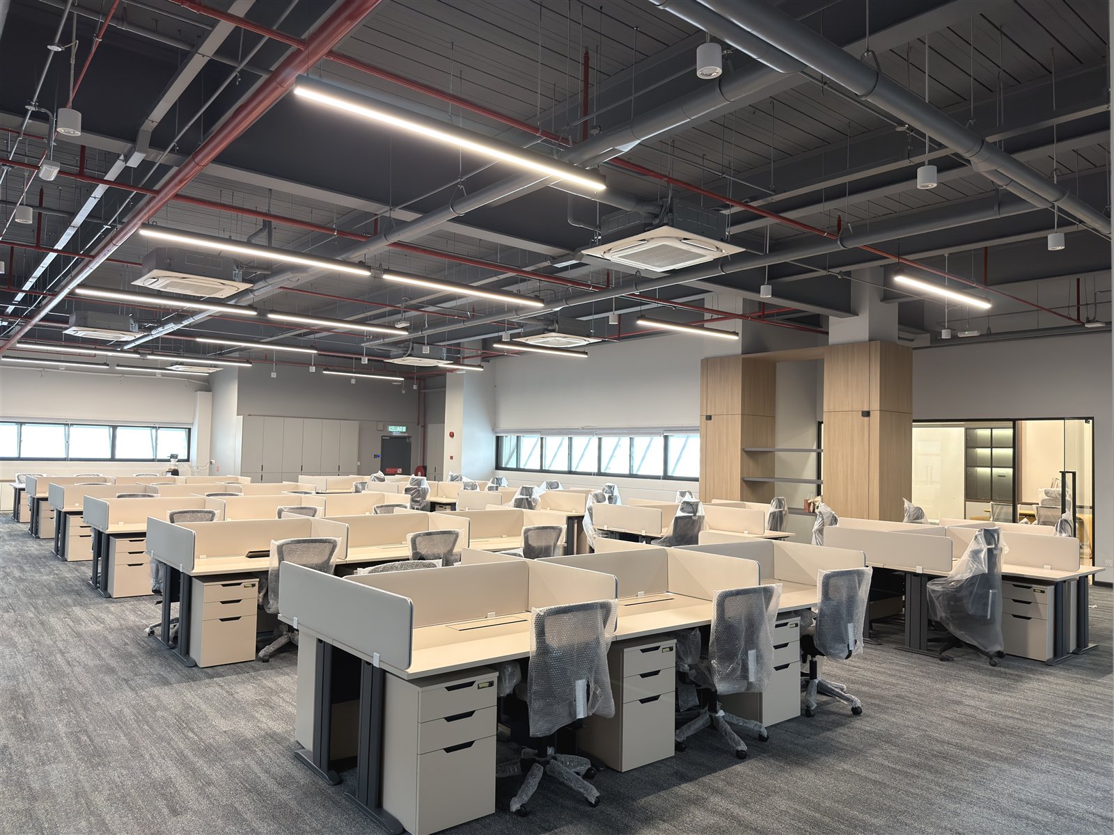 Open-plan workstations on a panel system delivered by UA Office in Shah Alam